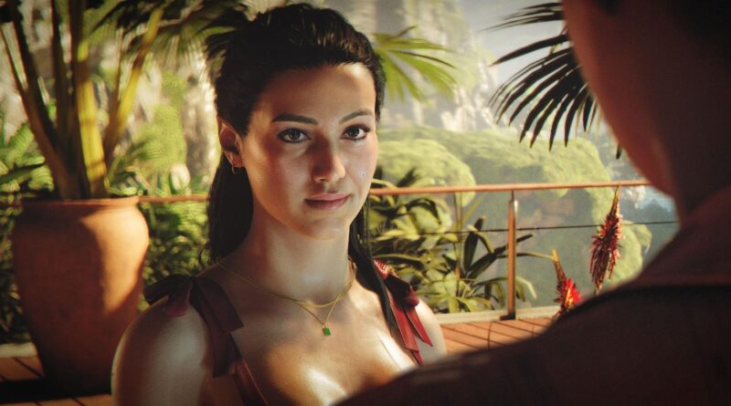 Close-up portrait of a woman with dark hair on a tropical balcony, looking toward the camera.