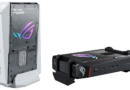 White ROG gaming desktop with a transparent side panel and glowing logo on the case, standing upright.
