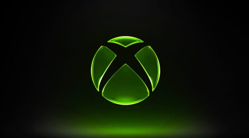 Glowing green Xbox logo centered on a dark background.