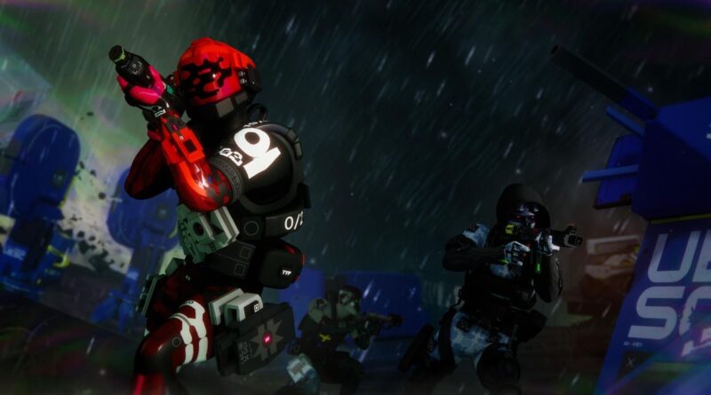 Red-armored soldier raises a bright red rifle in a rain-soaked sci‑fi battlefield, with teammates and cargo crates in the neon-lit background