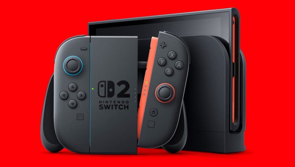Nintendo Switch with gray controllers featuring blue and orange accents against a vivid red background
