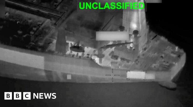 Aerial surveillance image of a ship's deck with target markers; UNCLASSIFIED in green at the top and a BBC News watermark.