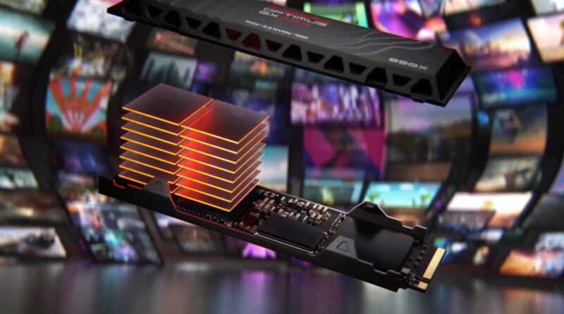 Mounted NVMe SSD with a stacked orange heatsink module, showing a high-performance storage drive with a cooling stack in a dark tech backdrop