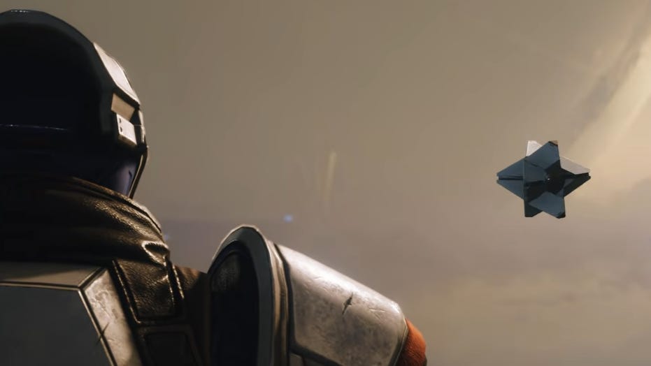 Armored sci-fi soldier watches a blue geometric star-shaped object floating in a hazy space backdrop.