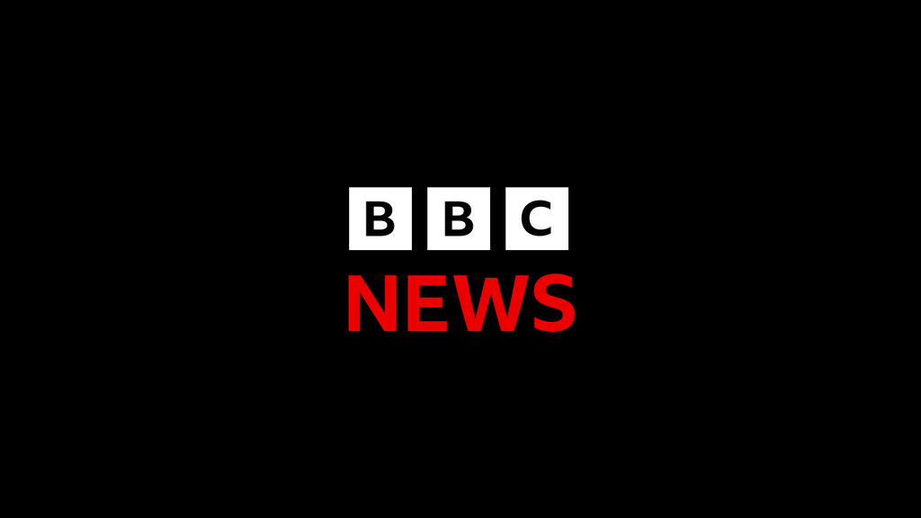 BBC News logo centered on a black background with white blocks and red 'NEWS' text