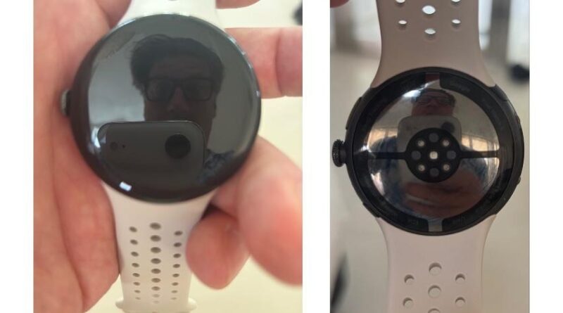 Two-panel image of a white smartwatch: left shows the black circular touchscreen with the photographer's reflection; right shows the back with a sensor ring and perforated strap.